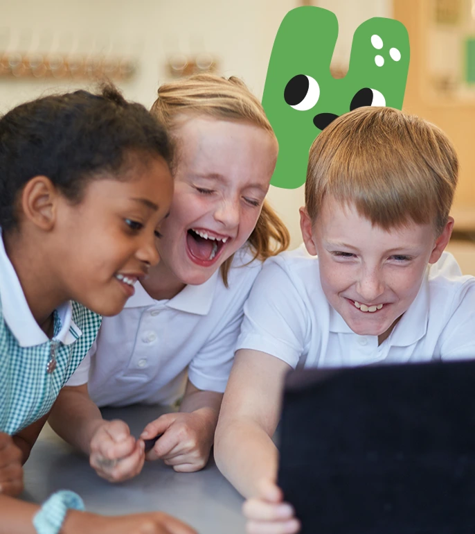 Children laughing look at ipad